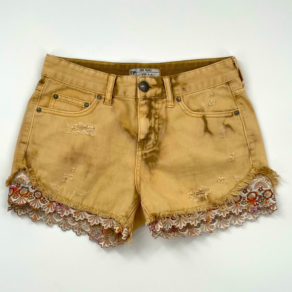 Free People Golden Bleach Dyed Distressed Denim Raw Hem Embroider Peek-Out Lace